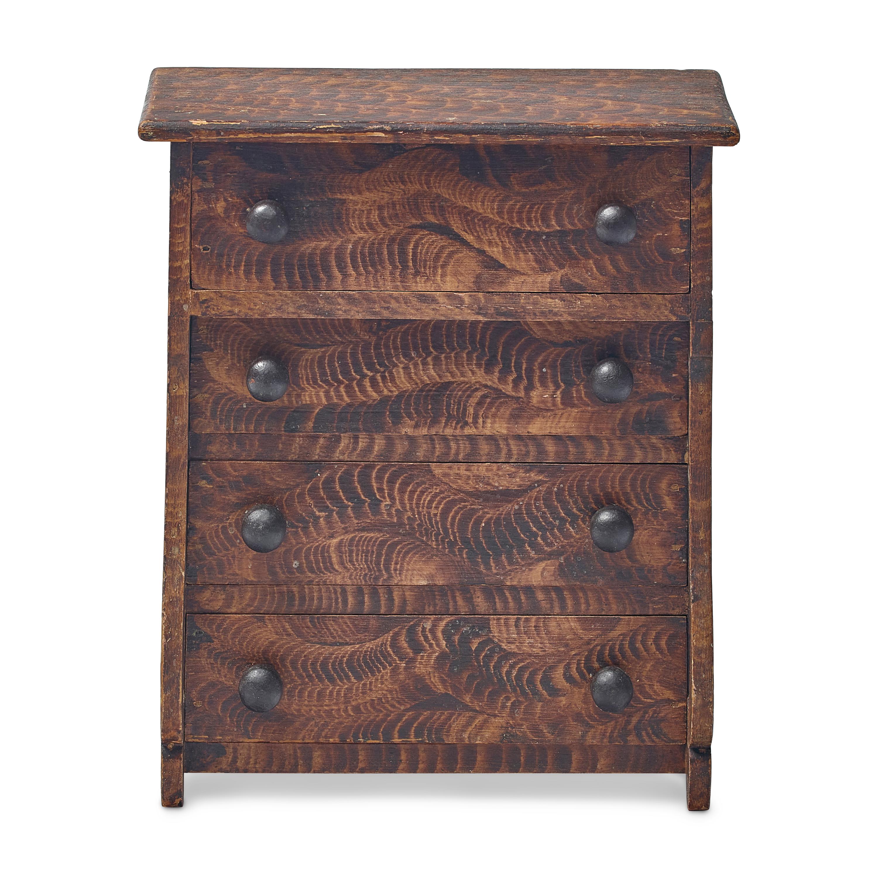 A Classical Grain Painted Pine Miniature Chest of Drawers