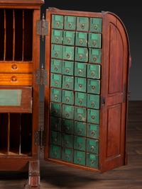 A Carved Walnut Wooton Secretary Desk