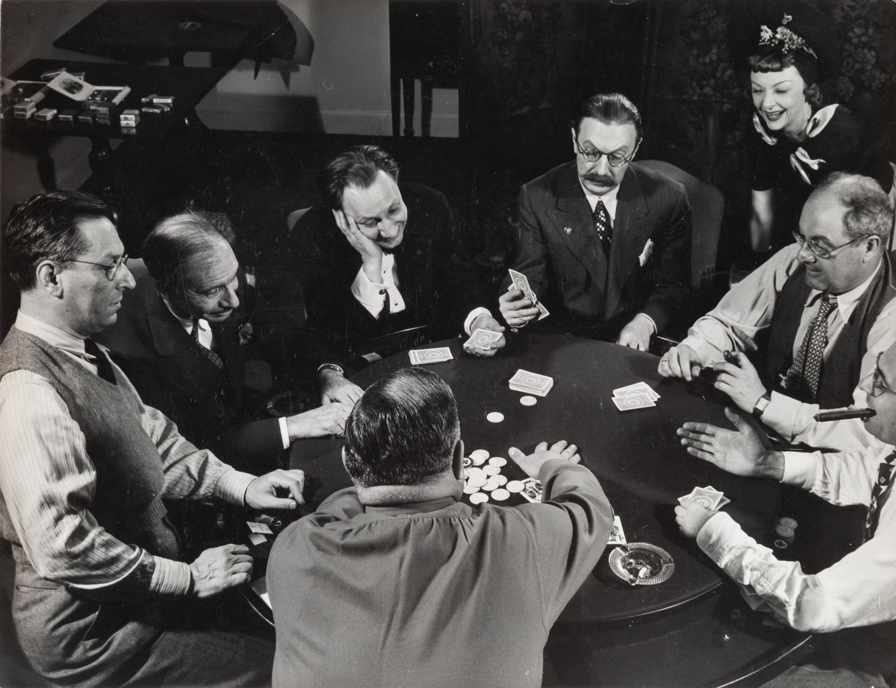 Frank Hall, Theron Bamberger, Franklin Adams, Russel Crouse, Howard Lindsay, Mike Wallach and Bernie Hart playing poker, 1941; printed ca. 1941