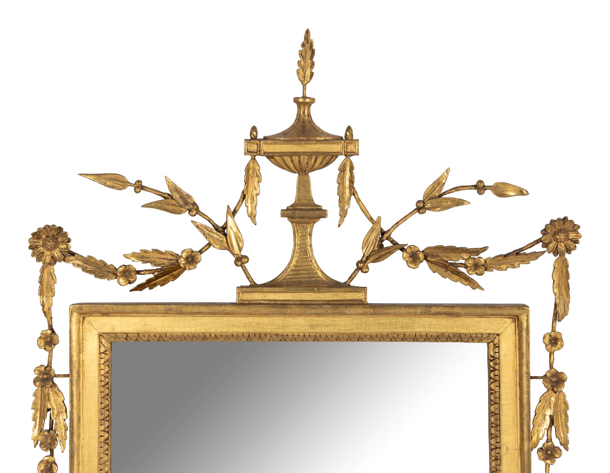 A George III Carved Giltwood Mirror