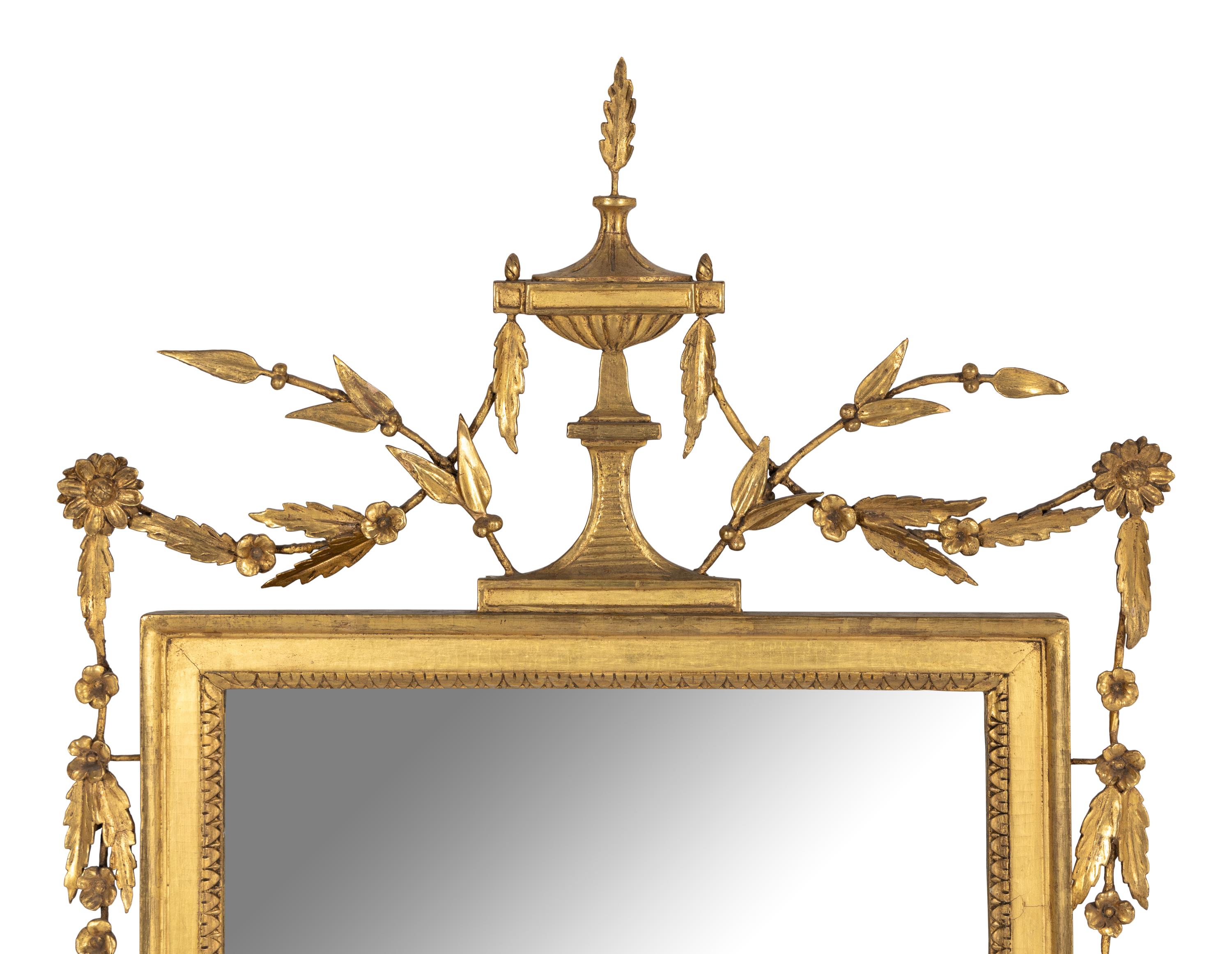 A George III Carved Giltwood Mirror