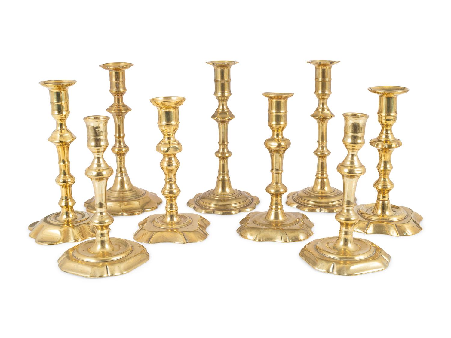 Nine English Brass Candlesticks