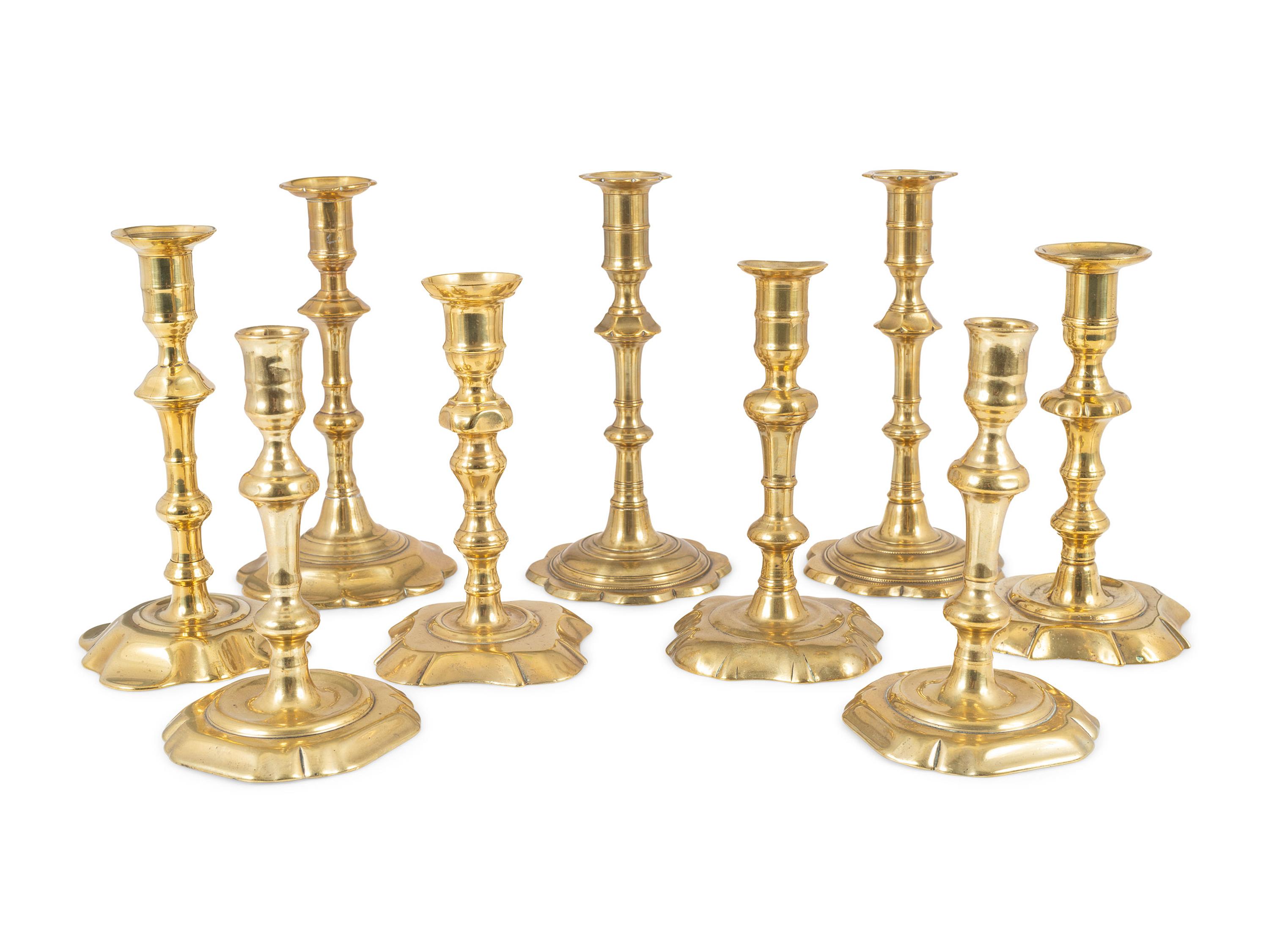 Nine English Brass Candlesticks