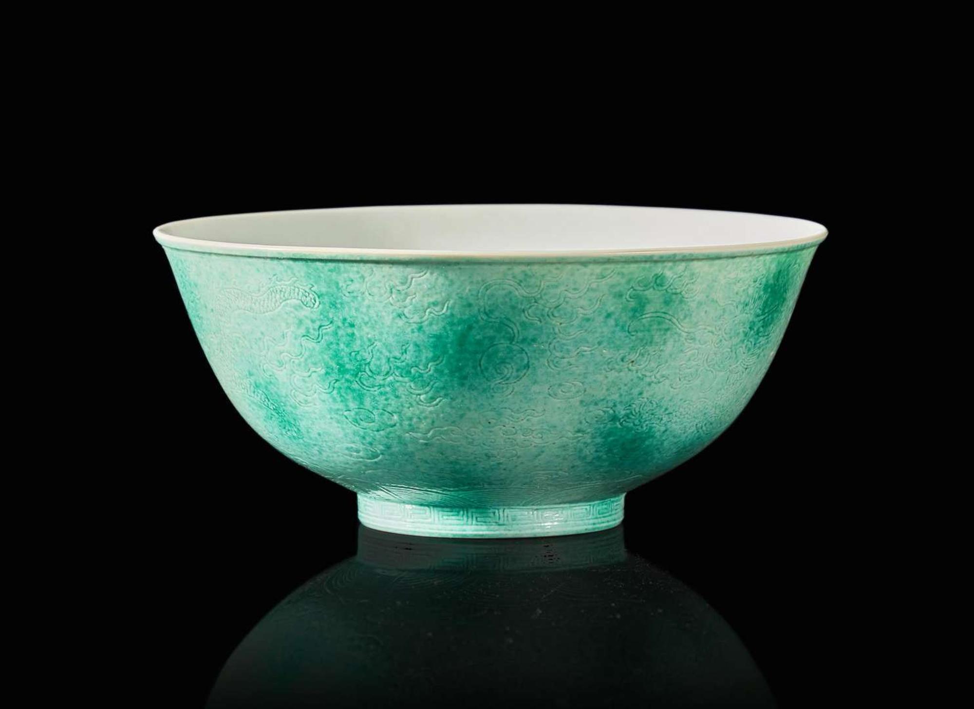 A Chinese incised porcelain faux-jadeite "Dragons" bowl, Tongzhi mark and of the period 龍紋瓷盌 同治款 清同治