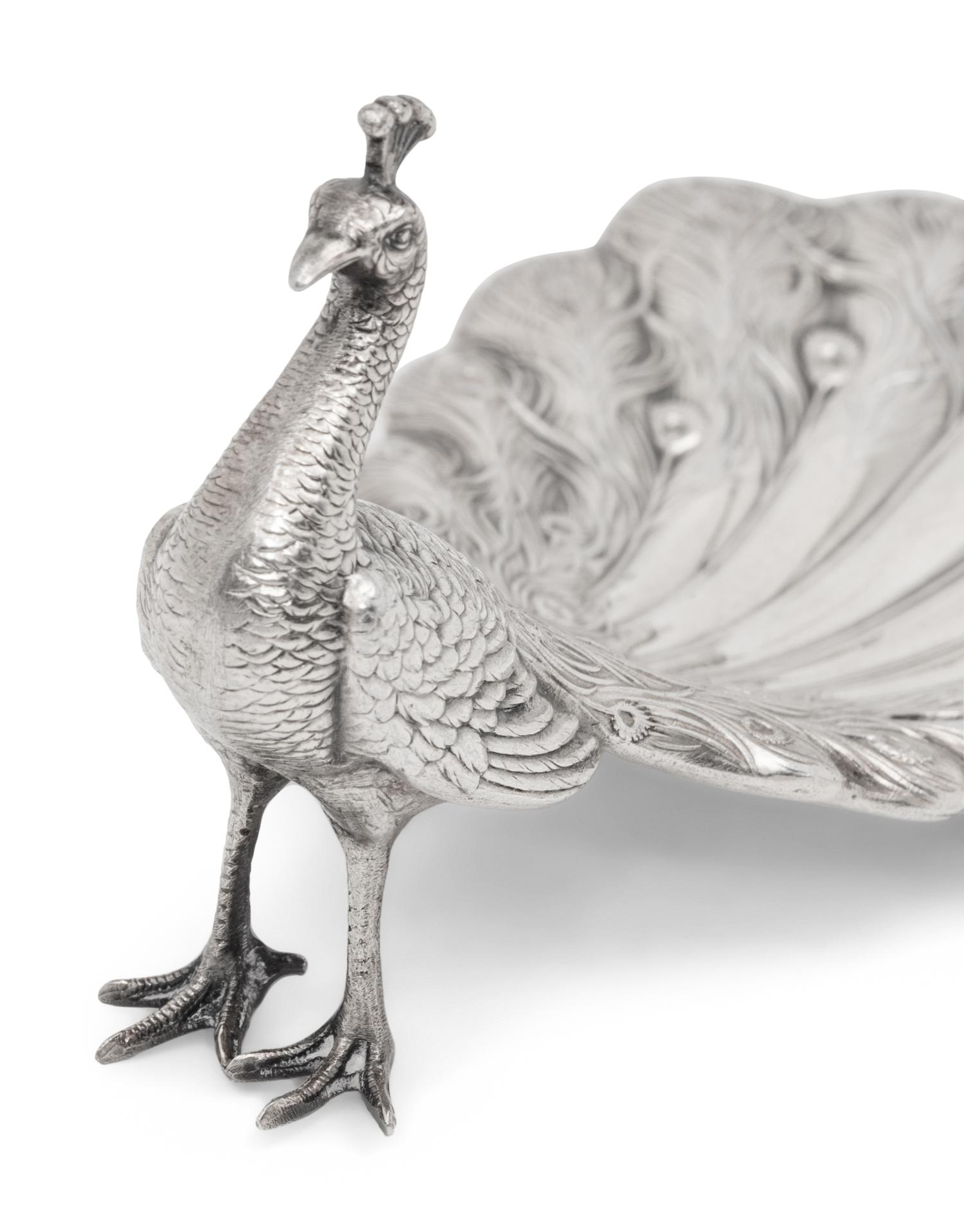 A Collection of Ten American Silver Peacock Table Ornaments