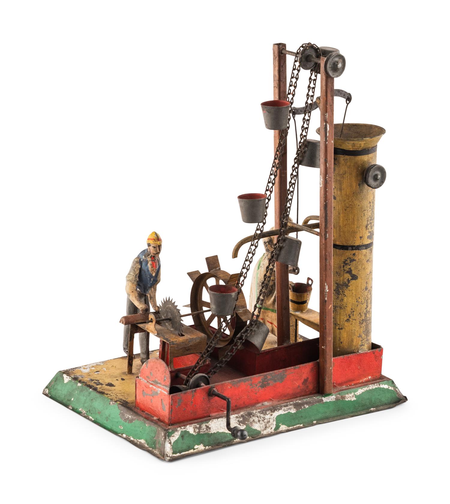 An Early Tin Water Elevator Toy