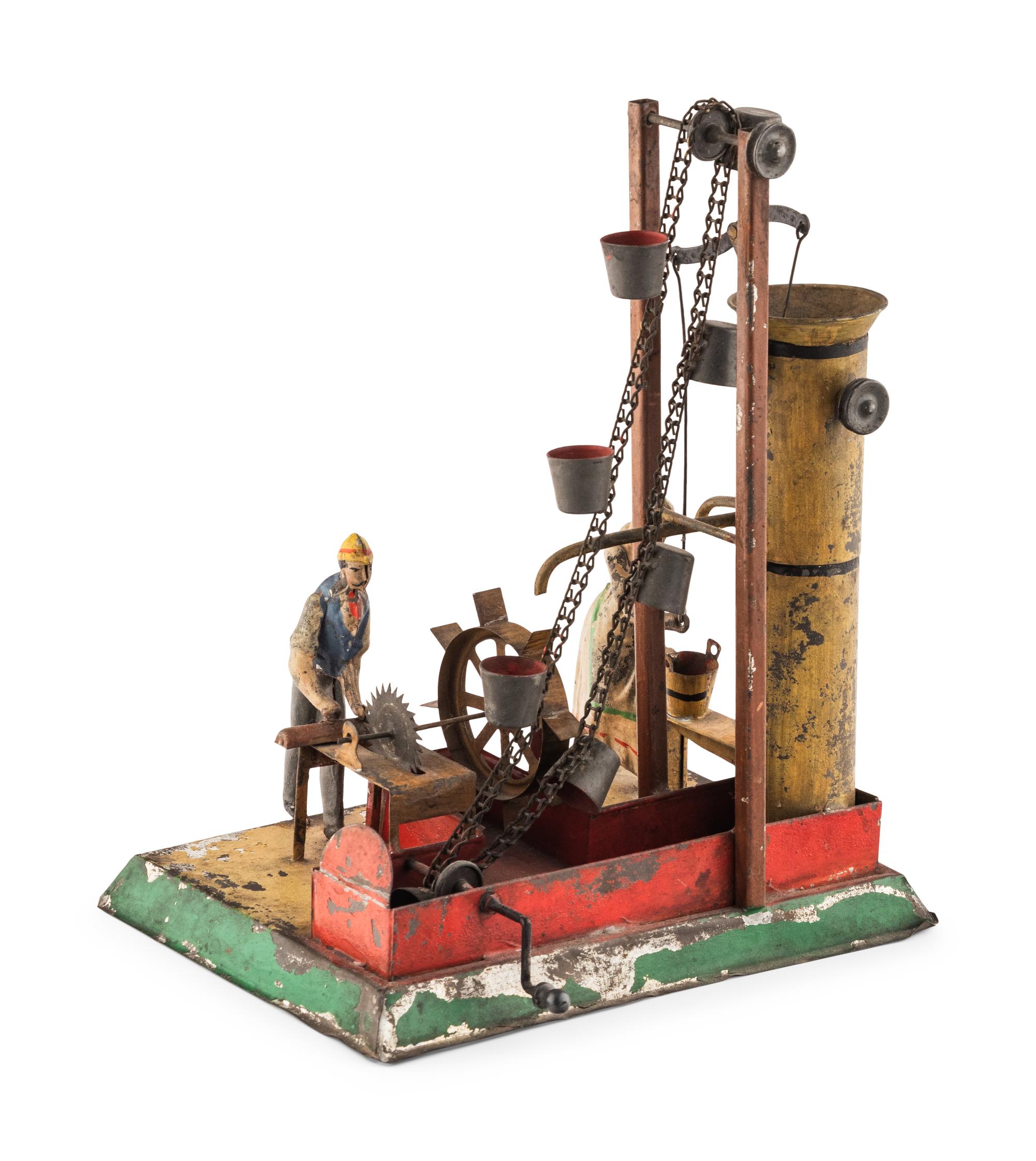 An Early Tin Water Elevator Toy