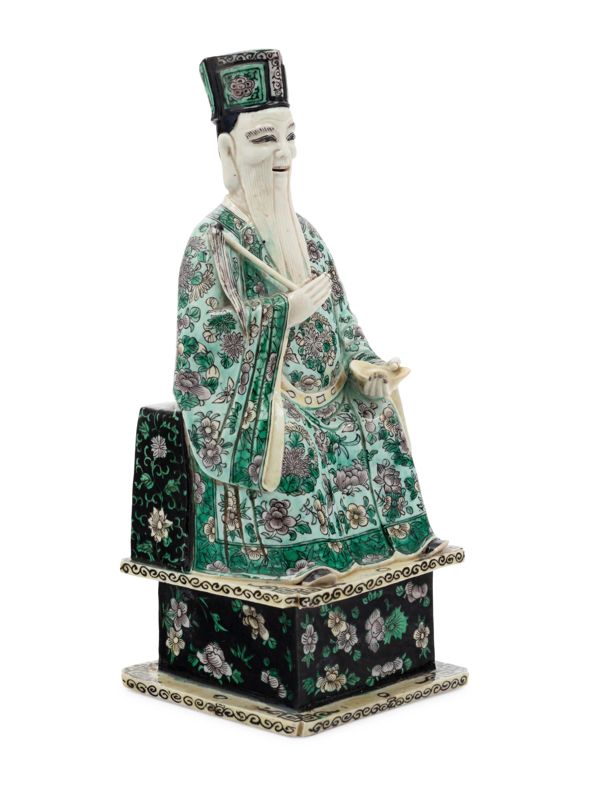 A Chinese Famille Verte Porcelain Figure of an Immortal