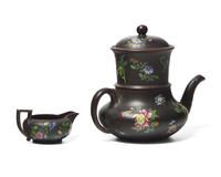 A Wedgwood Capriware Black Basalt Teapot with Strainer and Creamer