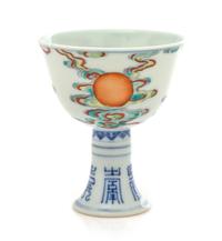A Chinese Doucai 'Sun' Porcelain Stem Cup