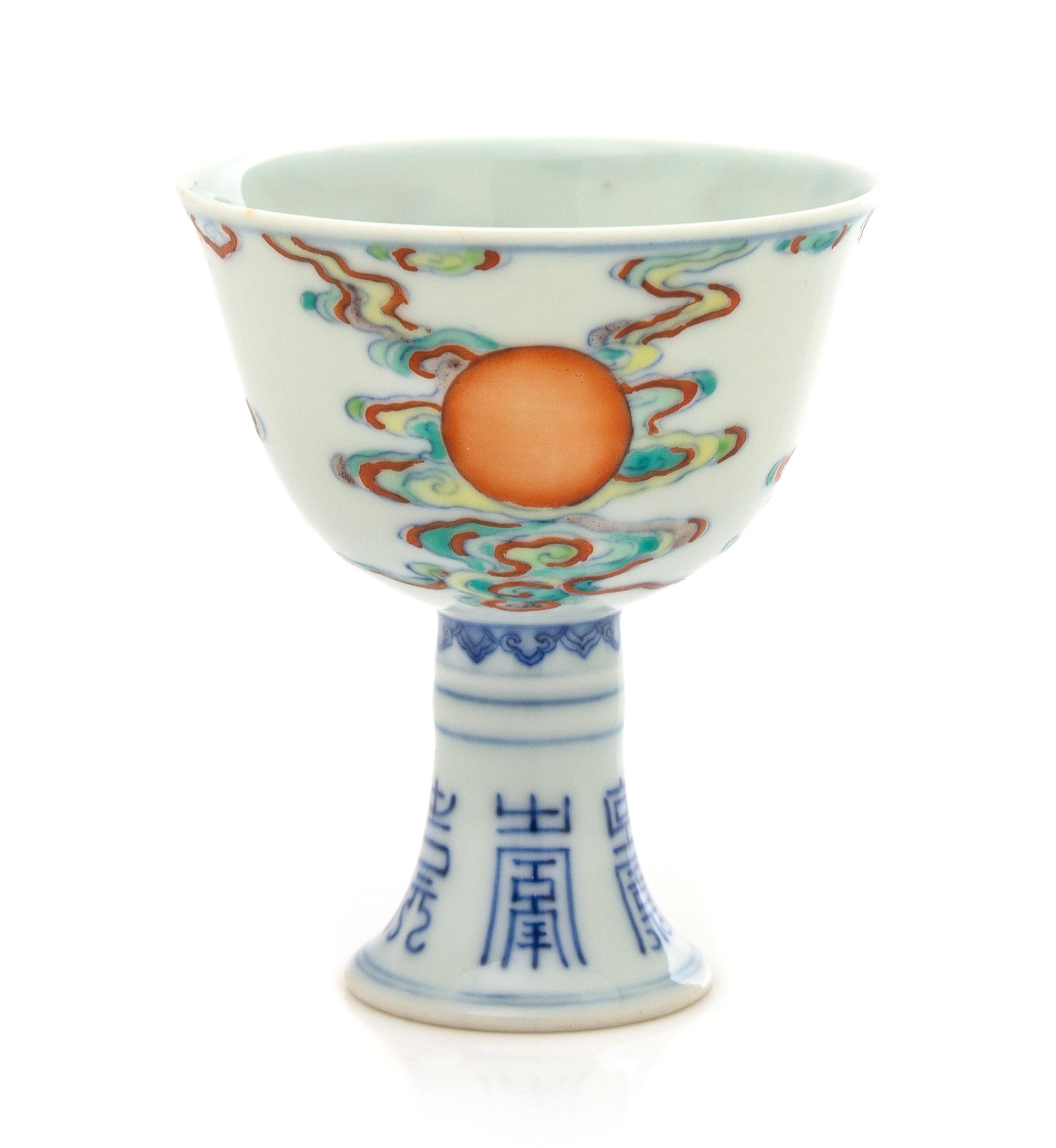 A Chinese Doucai 'Sun' Porcelain Stem Cup