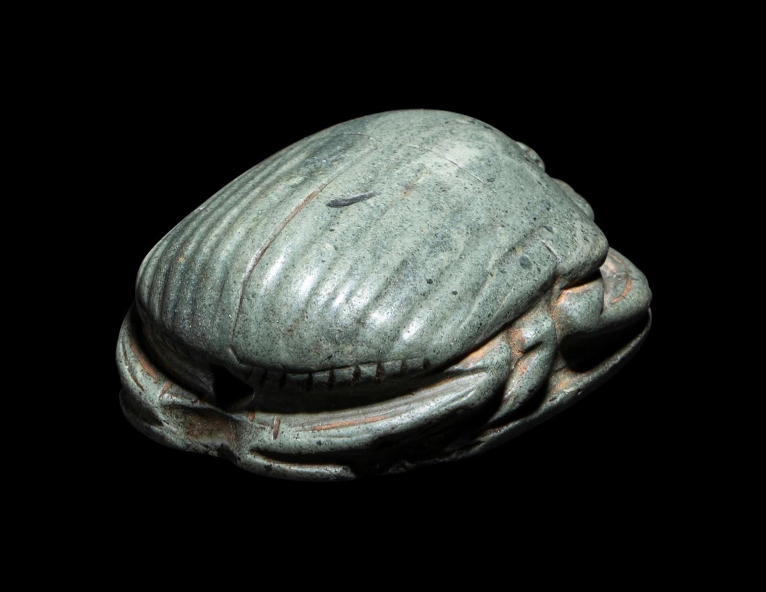 An Egyptian Faience Scarab with a Greek Inscription