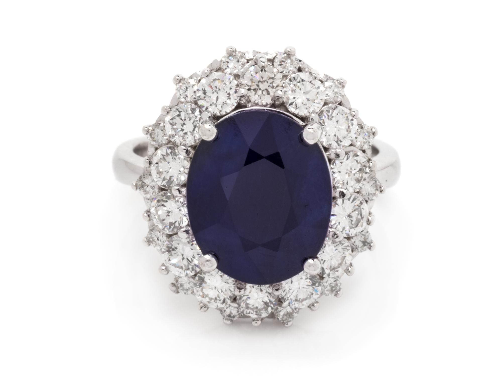 A 14 Karat White Gold, Sapphire and Diamond Ring,