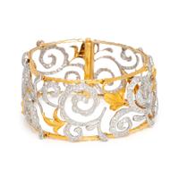 YELLOW GOLD, STERLING SILVER AND DIAMOND BRACELET