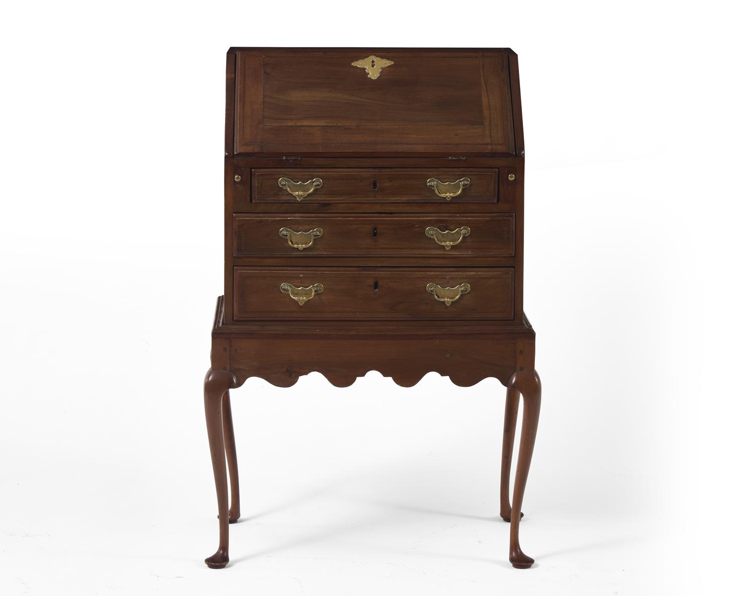 A Queen Anne walnut and maple inlaid child’s desk-on-frame, New England, mid-18th century
