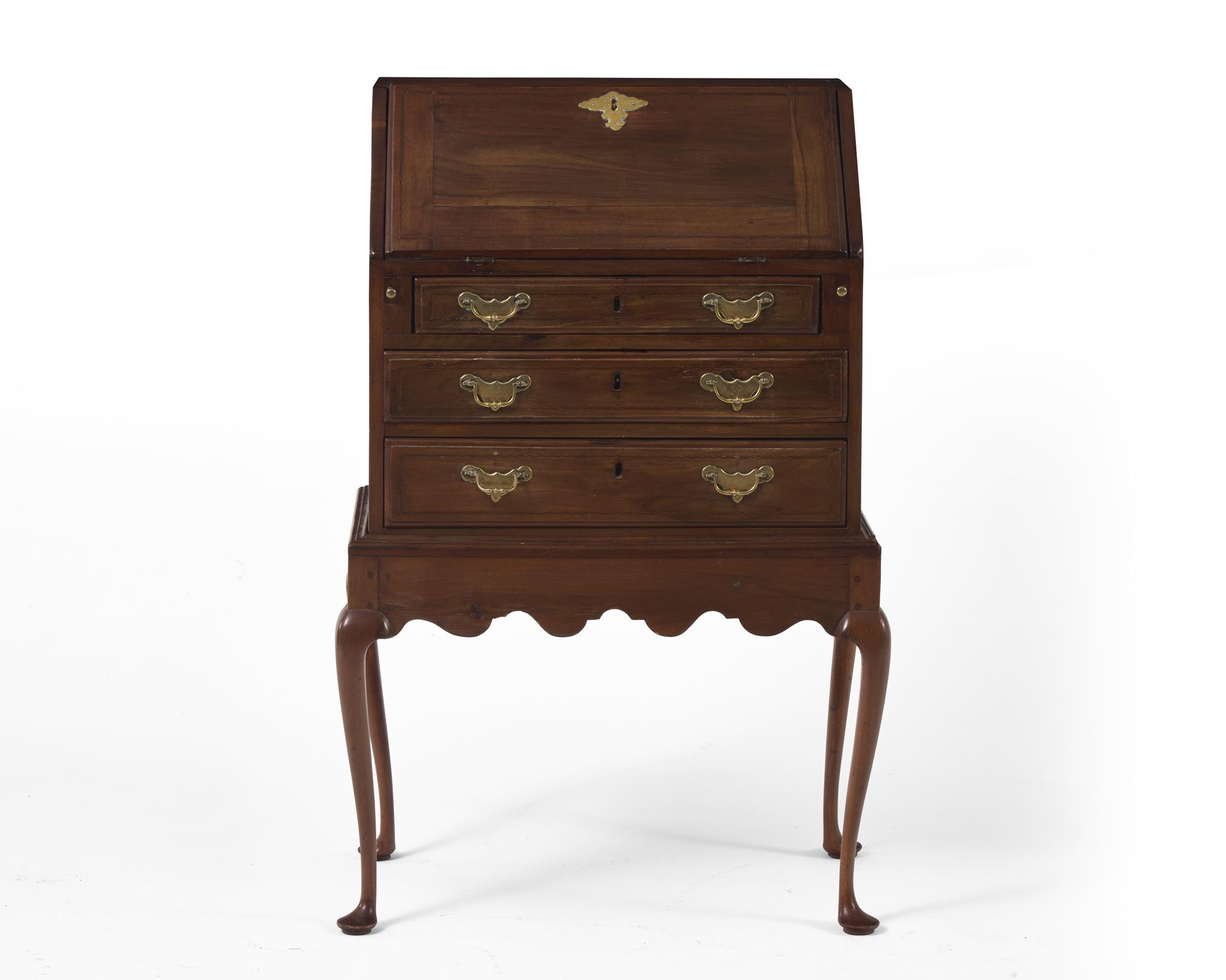 A Queen Anne walnut and maple inlaid child’s desk-on-frame, New England, mid-18th century