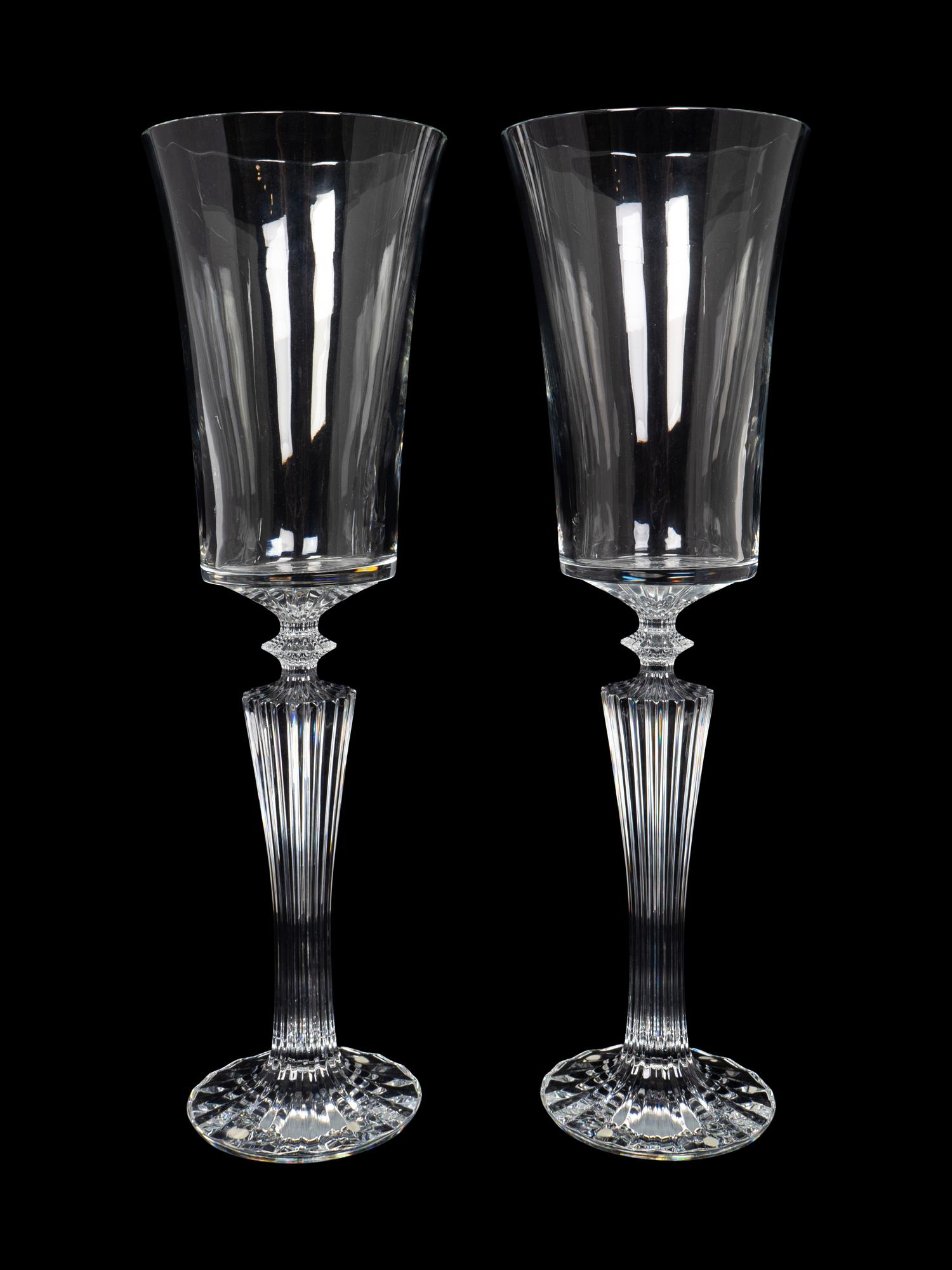 A Large Pair of Baccarat Glass Pedestal Vases