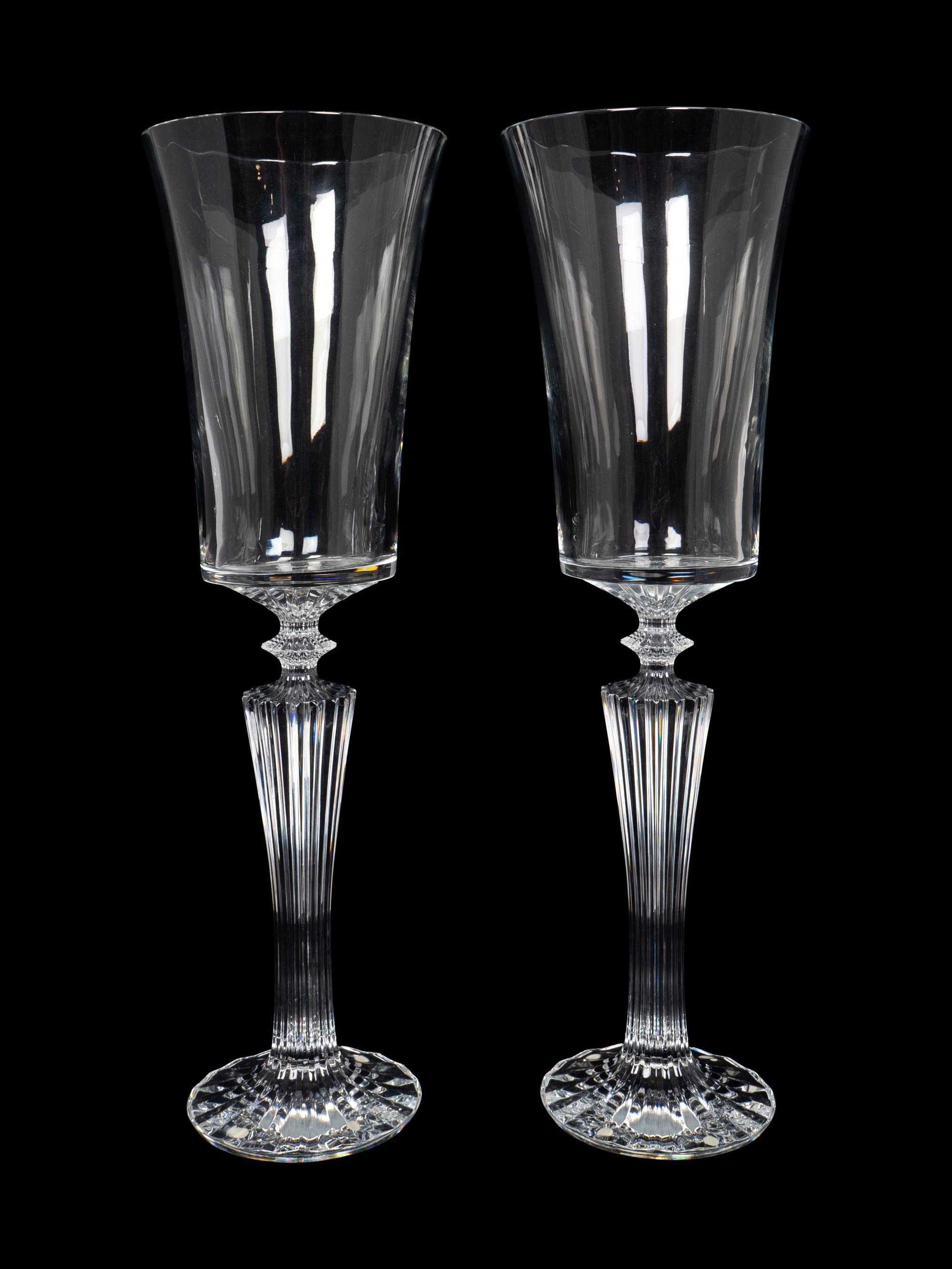 A Large Pair of Baccarat Glass Pedestal Vases