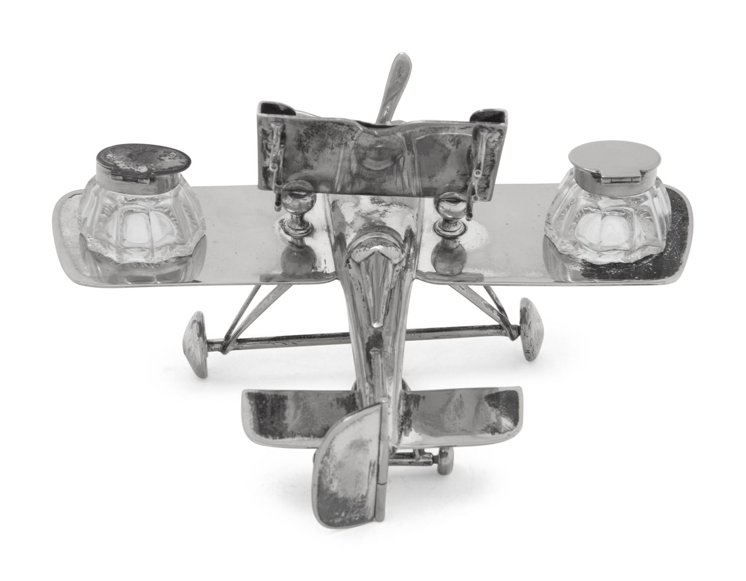 A Silver-Plate Airplane Form Ink-Well and Desk Calendar