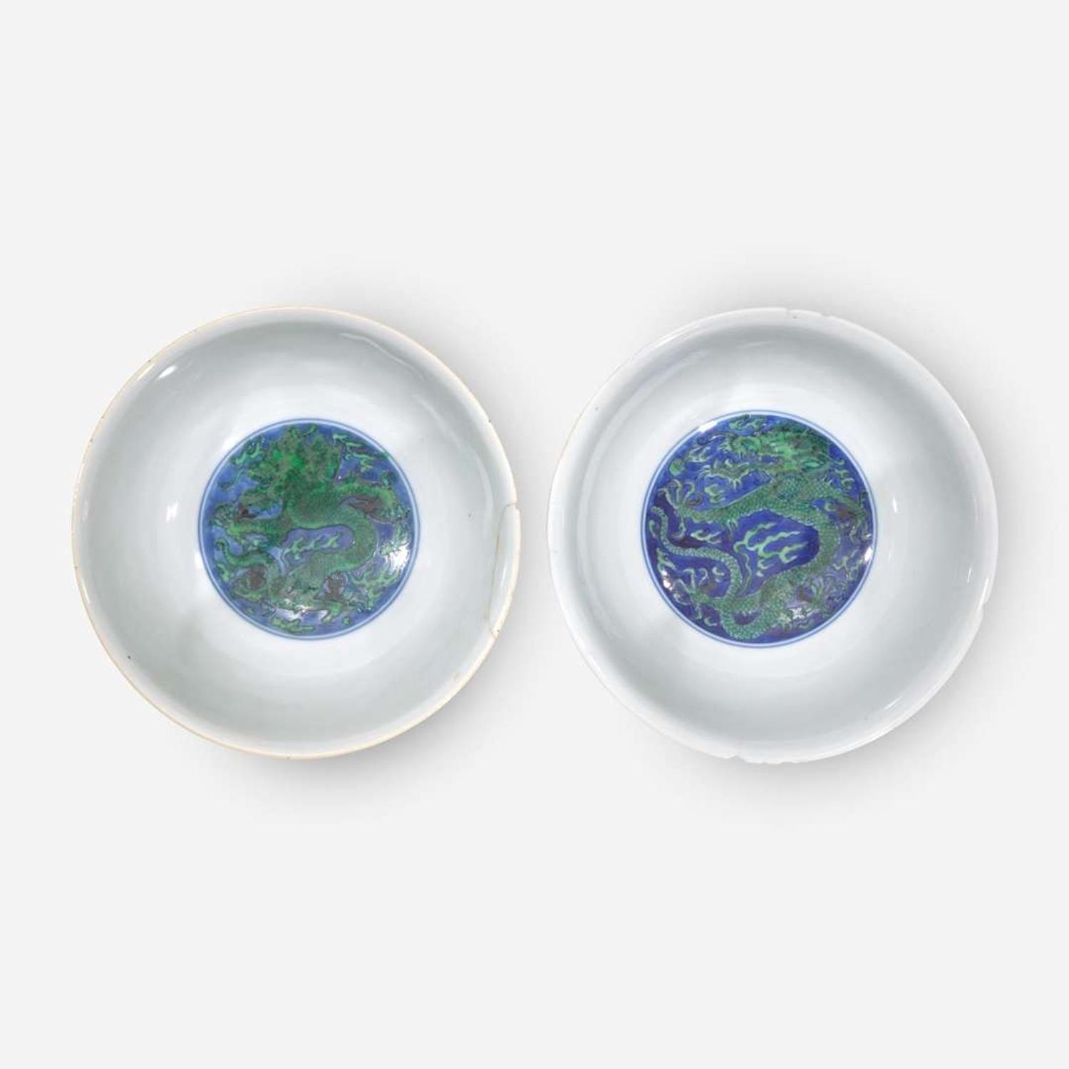 An associated pair of Chinese underglaze blue and green-enameled dragon bowls 珐琅彩青花龙纹碗一对 Kangxi six-character mark and of the period ????? ???