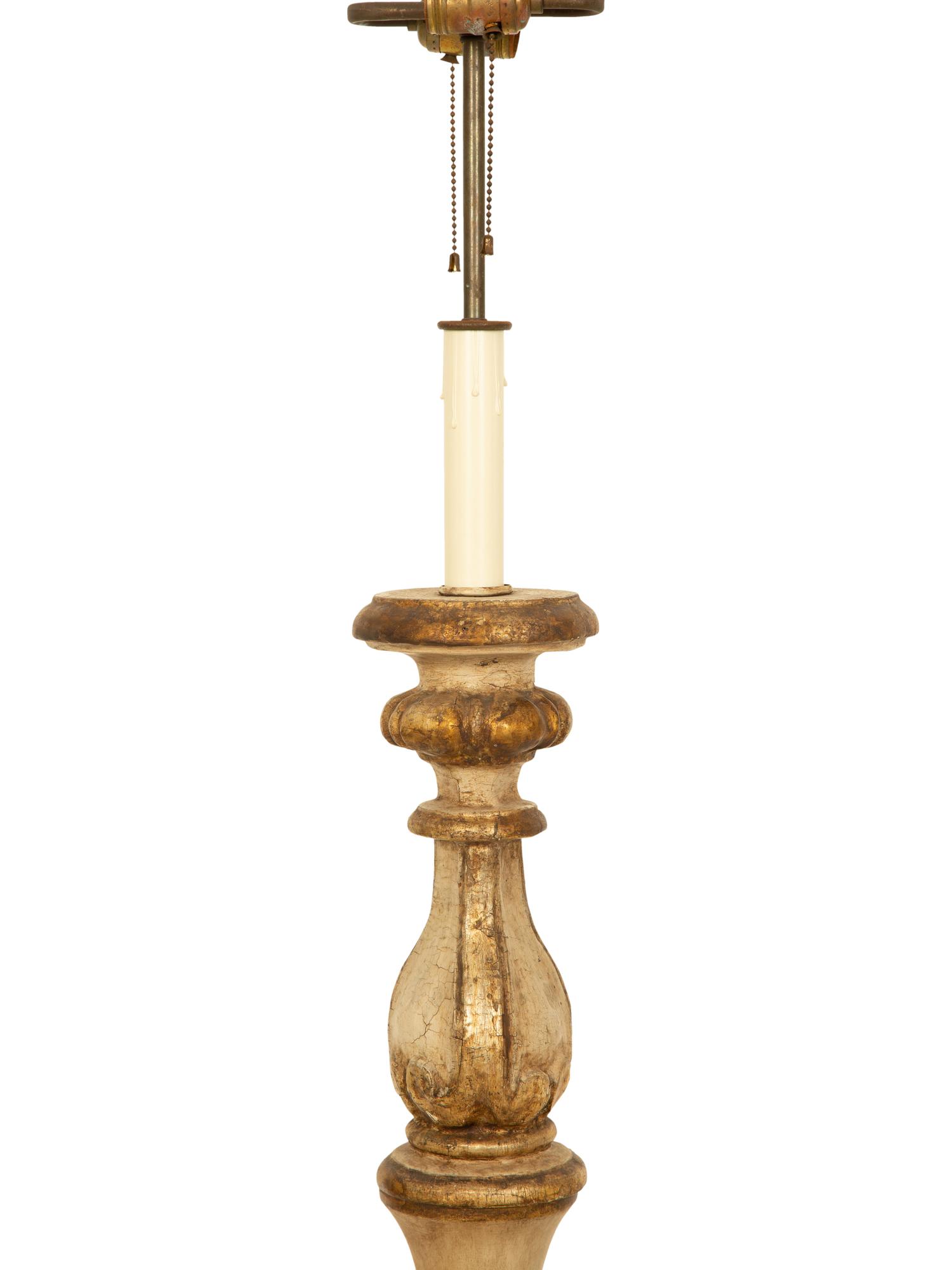 A Pair of Italian Baroque Style Painted and Parcel-Gilt Pricket Sticks