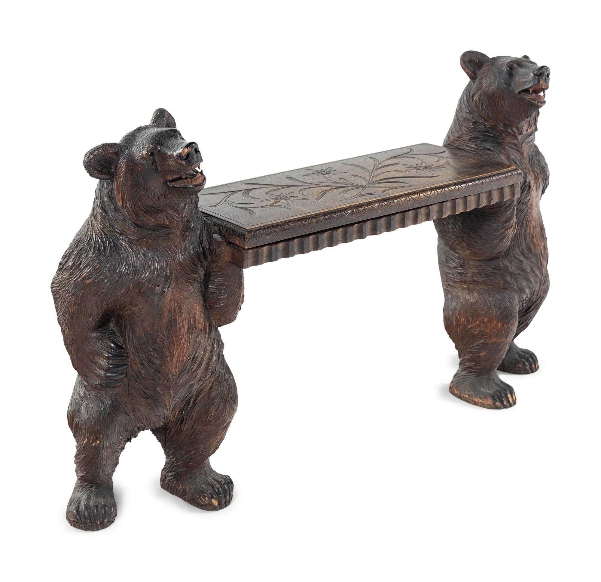 A Black Forest Carved Figural Hall Bench
