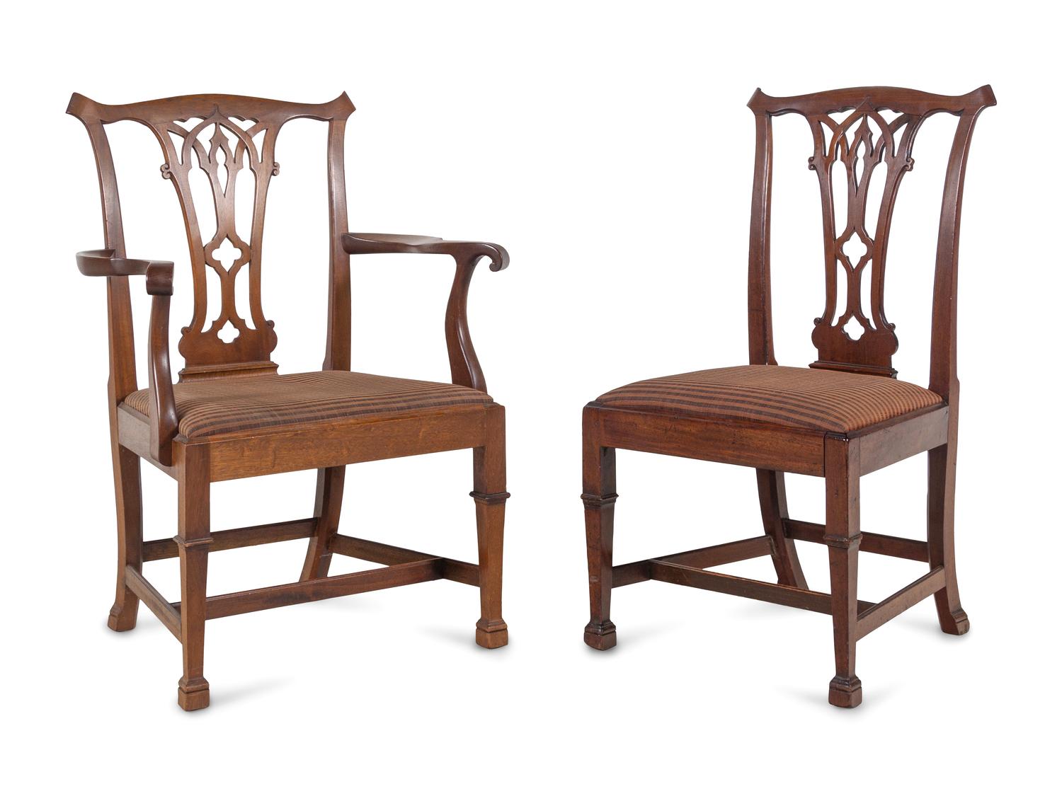 A Set of Eight George III Mahogany Dining Chairs in the Chippendale Taste