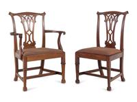 A Set of Eight George III Mahogany Dining Chairs in the Chippendale Taste