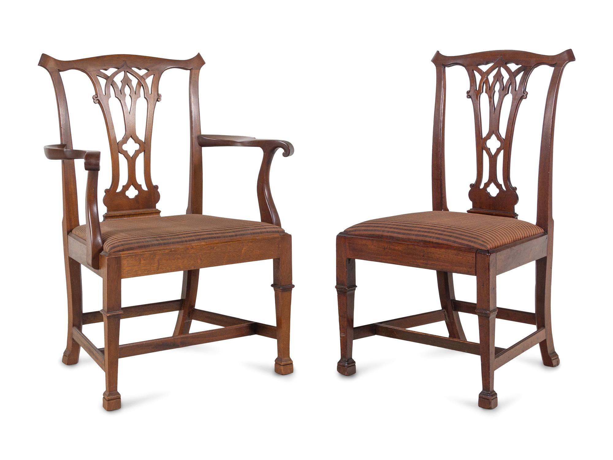 A Set of Eight George III Mahogany Dining Chairs in the Chippendale Taste
