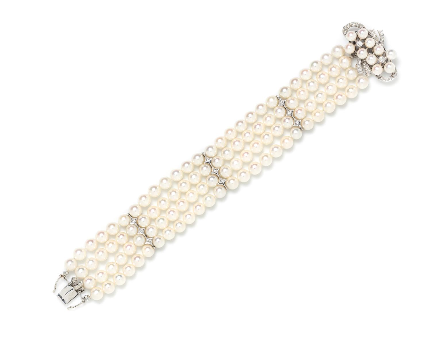 A White Gold, Diamond and Cultured Pearl Multi Strand Bracelet,