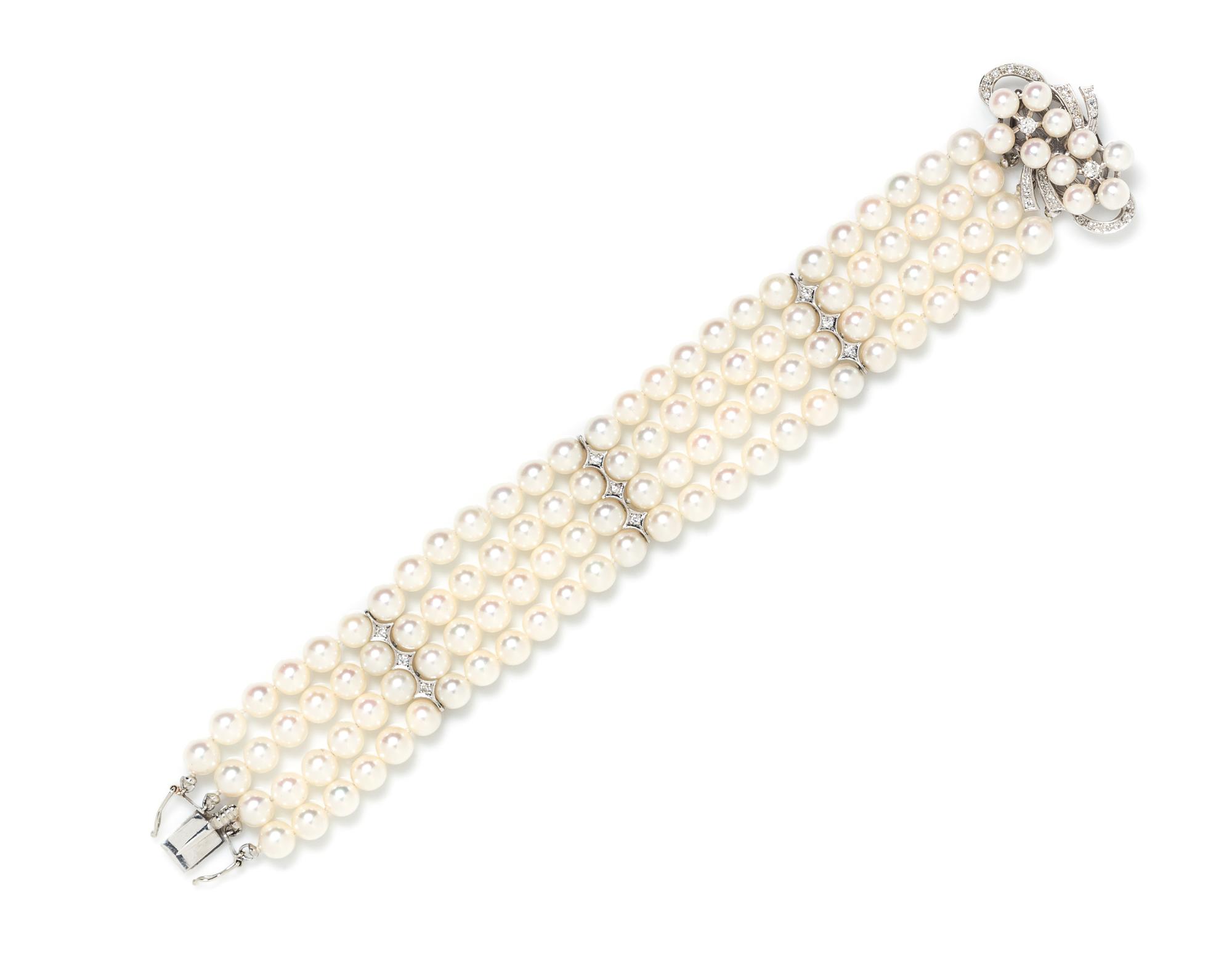 A White Gold, Diamond and Cultured Pearl Multi Strand Bracelet,