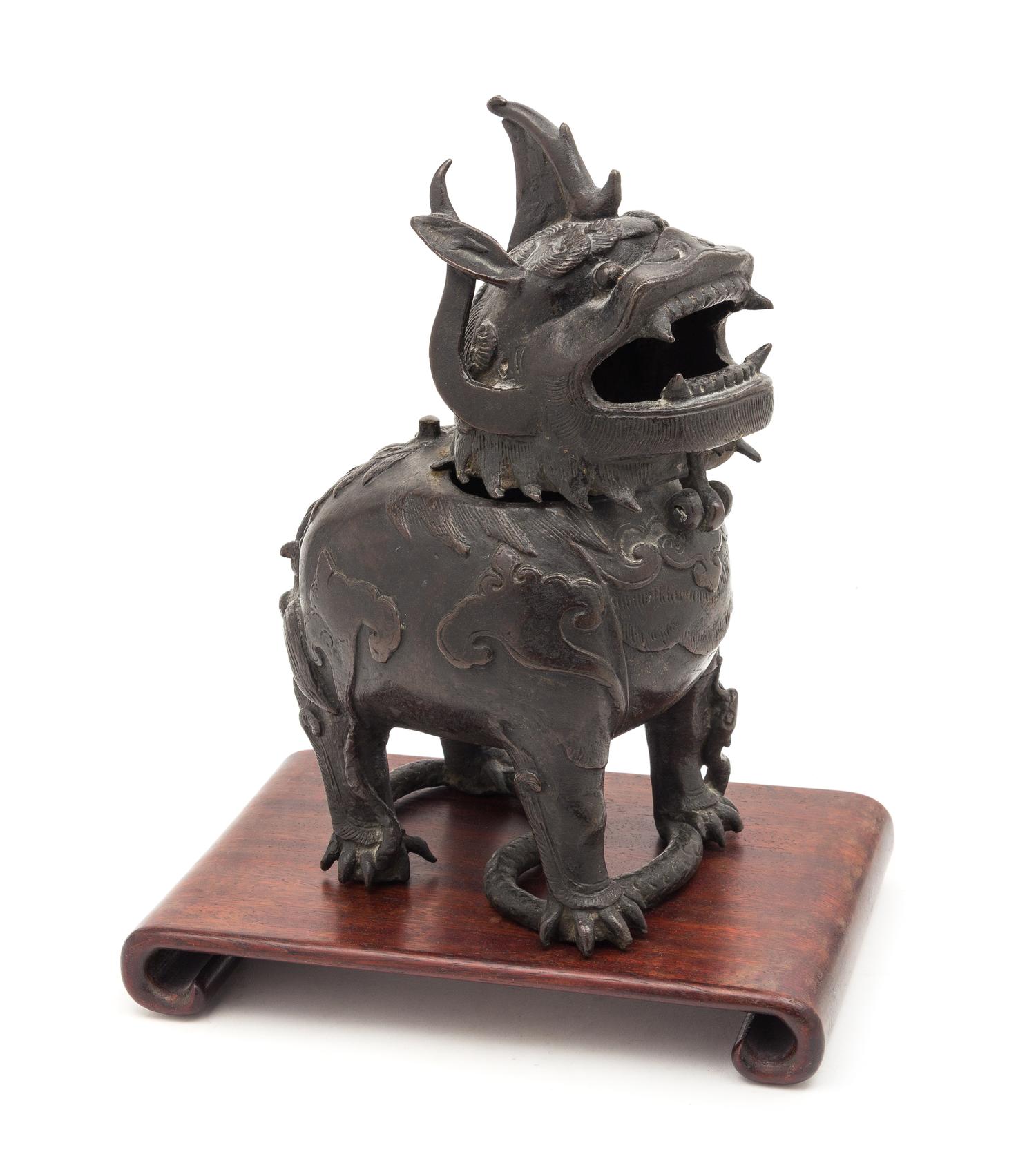 A Bronze Mythical Beast-Form Incense Burner Height 13 inches. — 19TH CENTURY