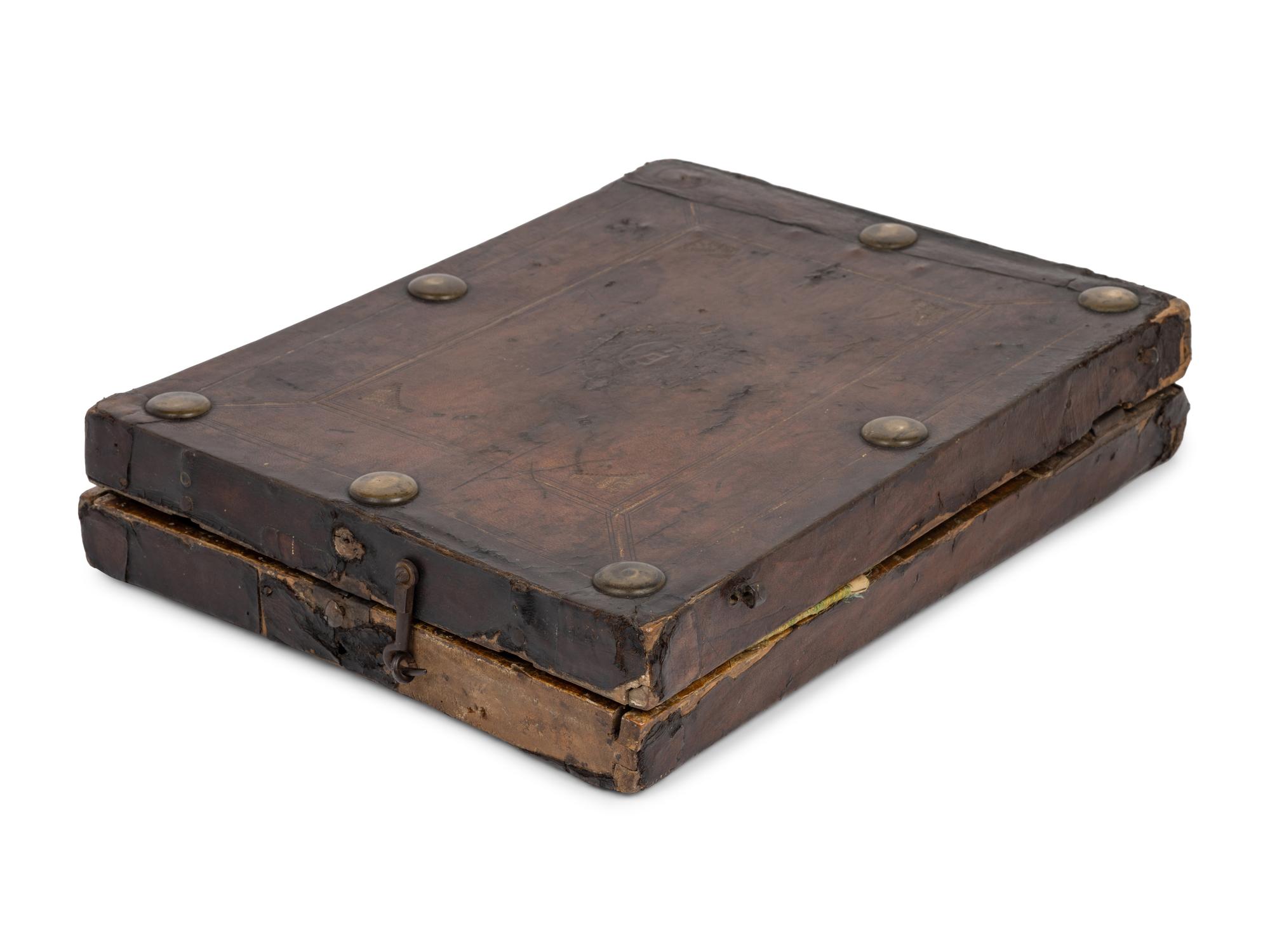 A German Leather-Cased Giltwood Traveling Altar