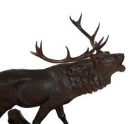 A Swiss Black Forest Carved Walnut Figure of an Elk