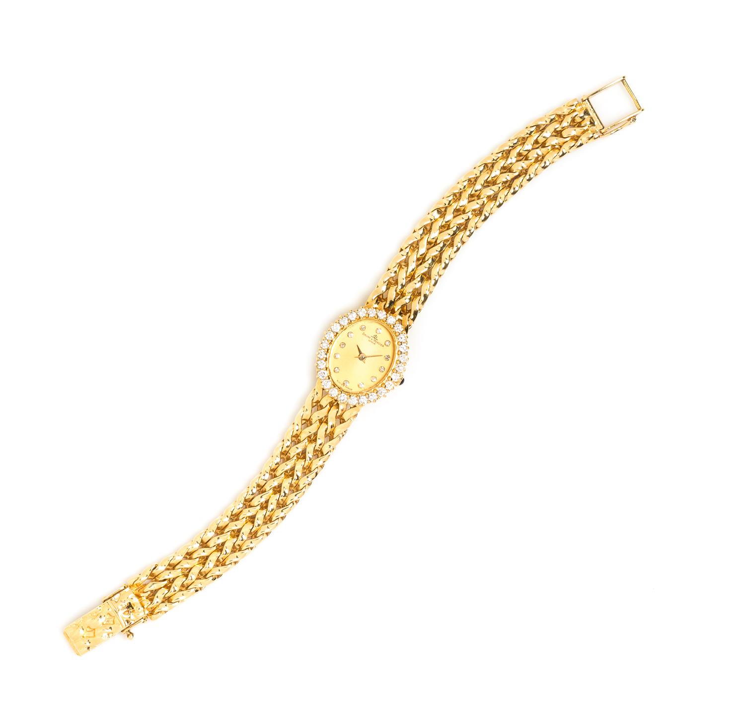An 18 Karat Yellow Gold and Diamond Wristwatch, Baume and Mercier, 28.10 dwts.