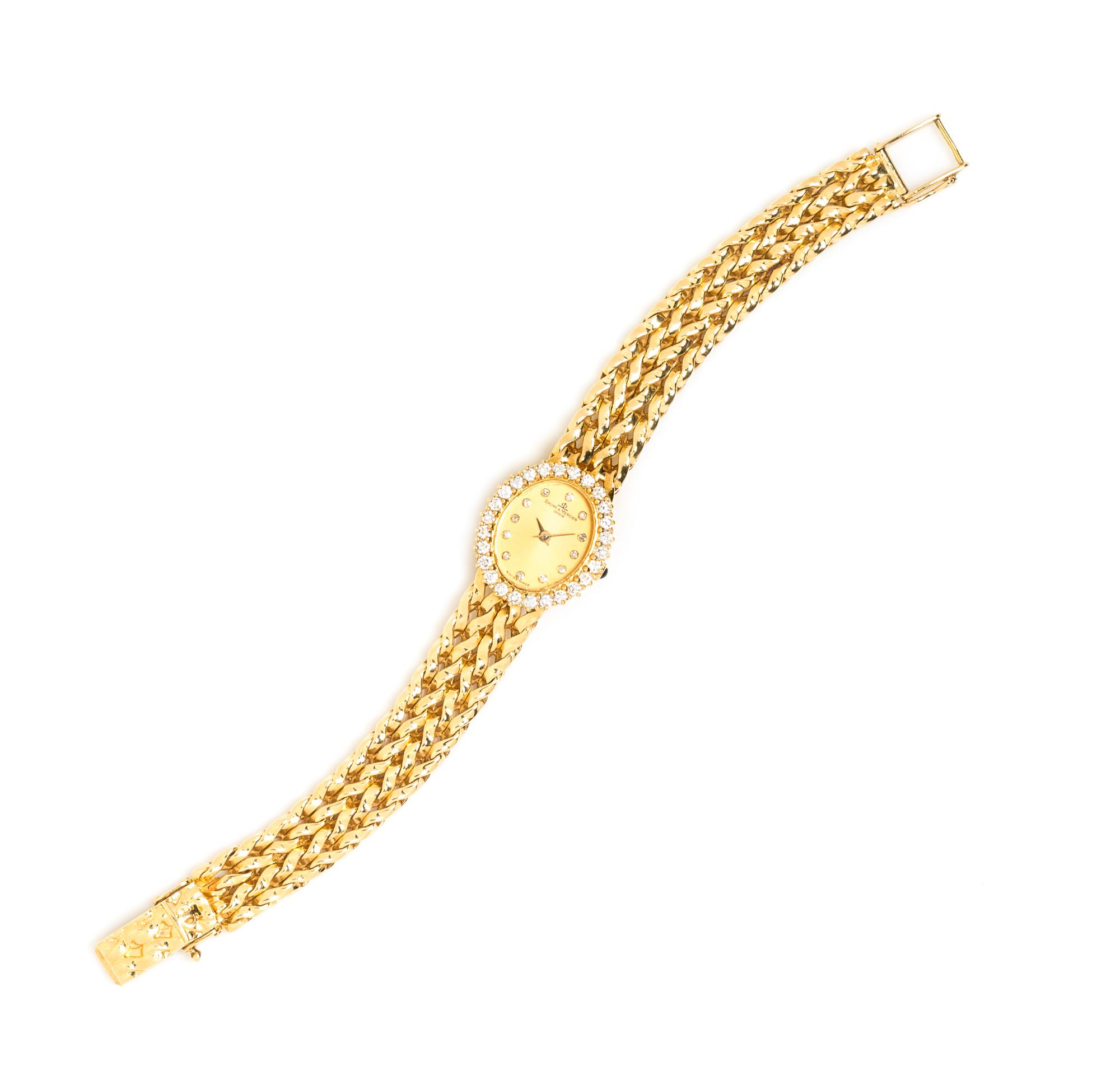 An 18 Karat Yellow Gold and Diamond Wristwatch, Baume and Mercier, 28.10 dwts.
