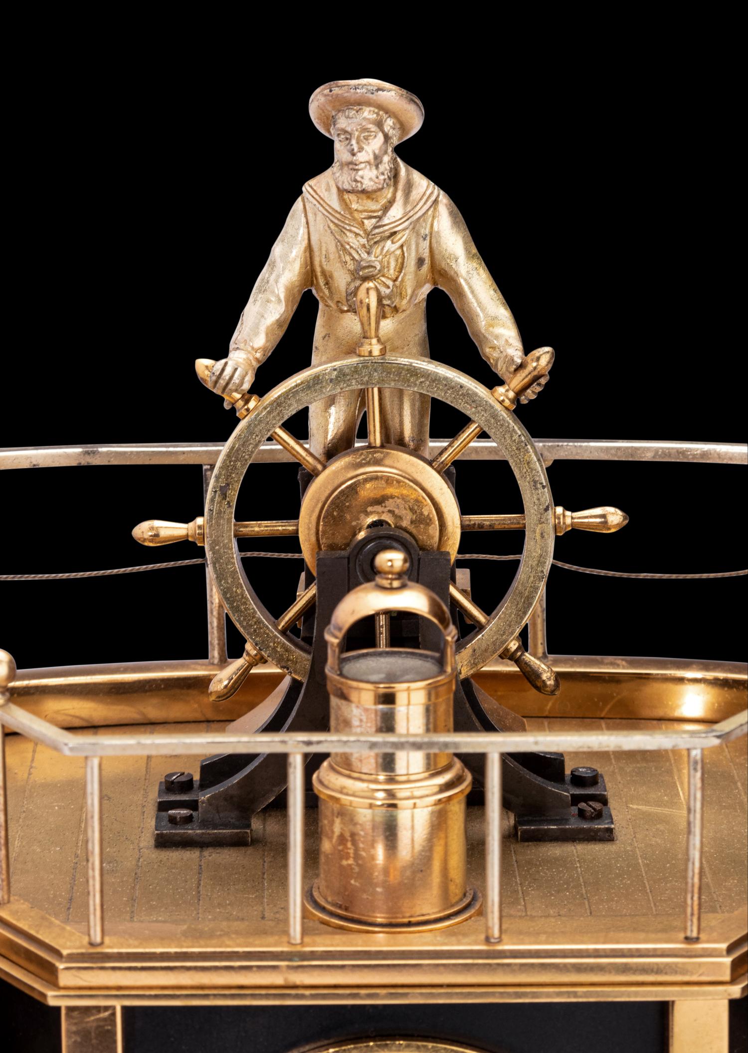 A French Gilt and Patinated Bronze and Marble Industrial Quarterdeck Automaton Clock, Andre Romain Guilmet