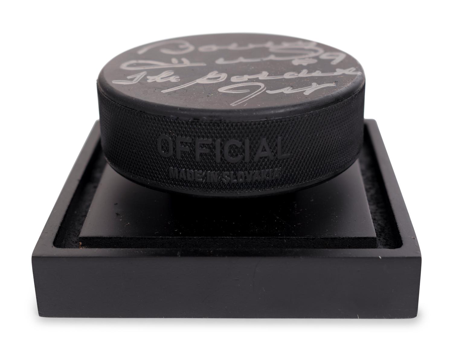 (Sports) A group of hockey memorabilia, comprising: