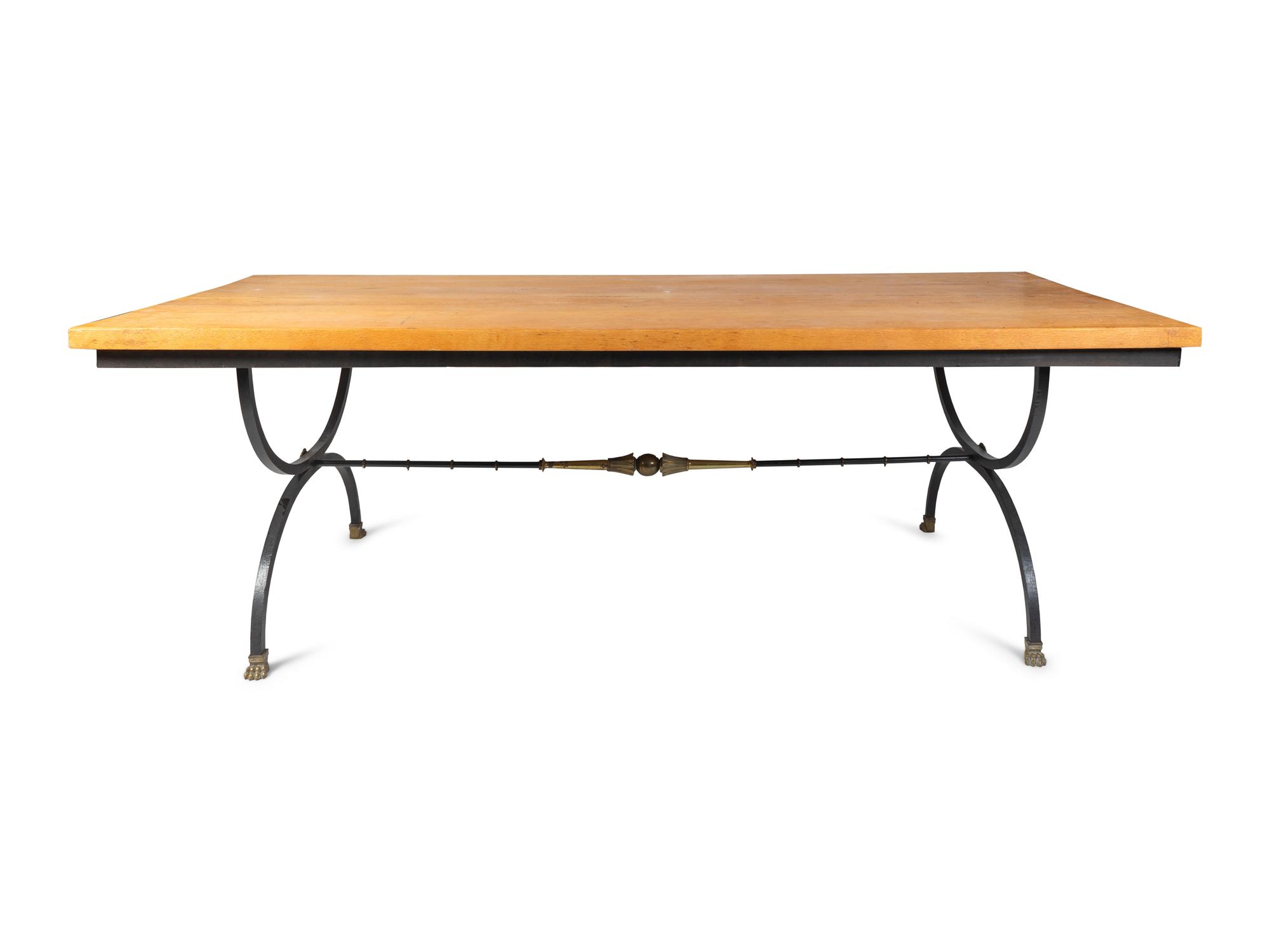 A Neoclassical Style Iron Base Dining Table — 20TH CENTURY