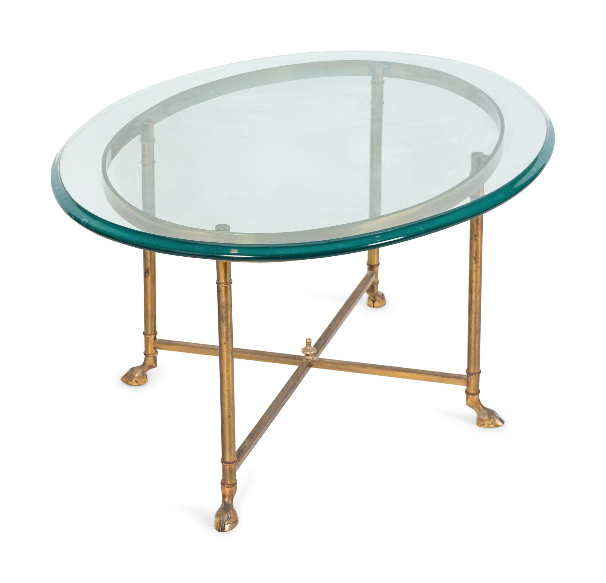 A Contemporary Brass and Glass Oval Coffee Table — 20TH CENTURY