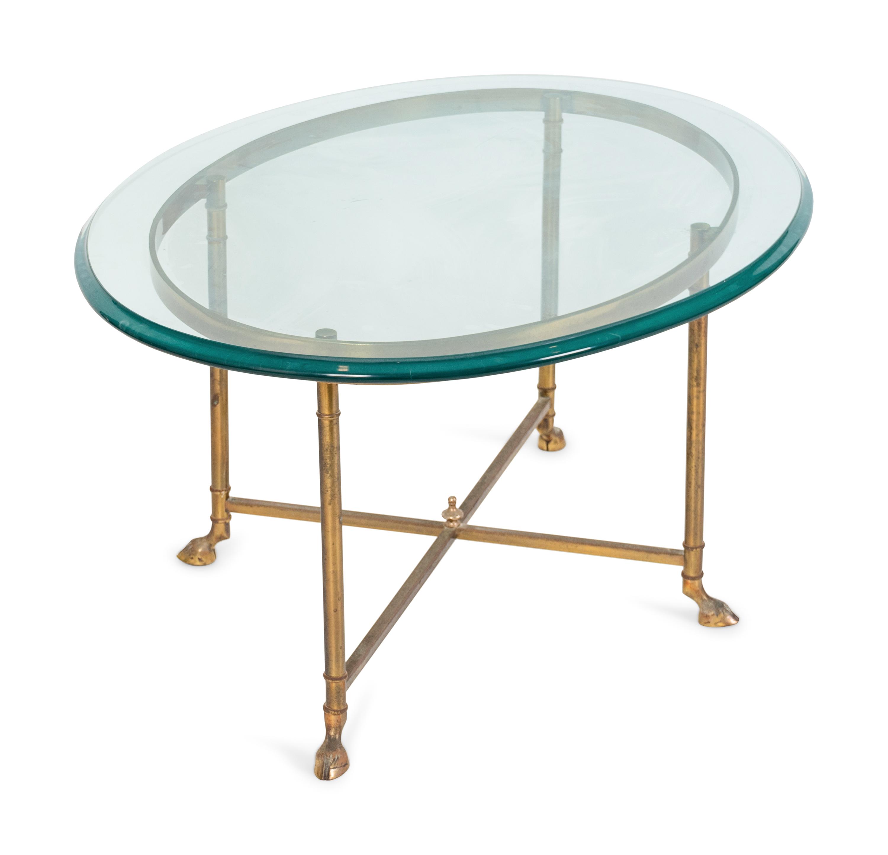 A Contemporary Brass and Glass Oval Coffee Table — 20TH CENTURY