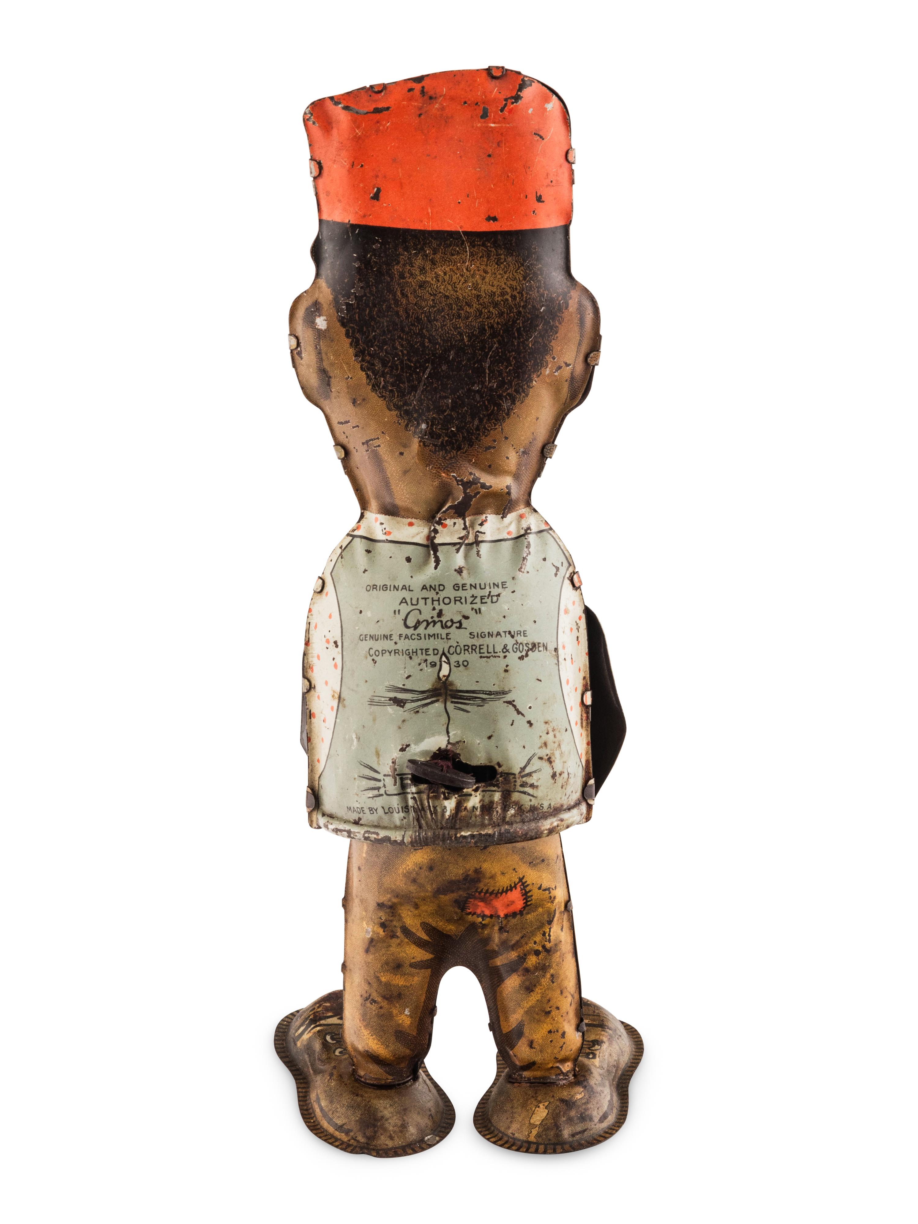 A Group of Three Tin Lithograph Walker Toys