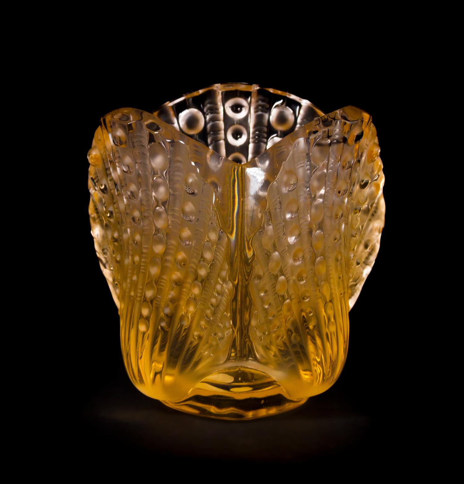 A Lalique Molded and Frosted Amber Glass Vase, Height 4 5/8 inches.
