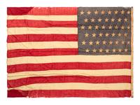 [SPANISH AMERICAN WAR]. 45-star Spanish American War-era flag identified to George W. Potter, Company K, 2nd Massachusetts Infantry, with related stereoviews, bookends, and other imprints.