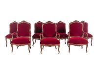 An Italian Louis XV Style Carved and Parcel Gilt Walnut Parlor Suite