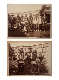[NATIVE AMERICANS]. Two large format photographs of armed Native American subjects.