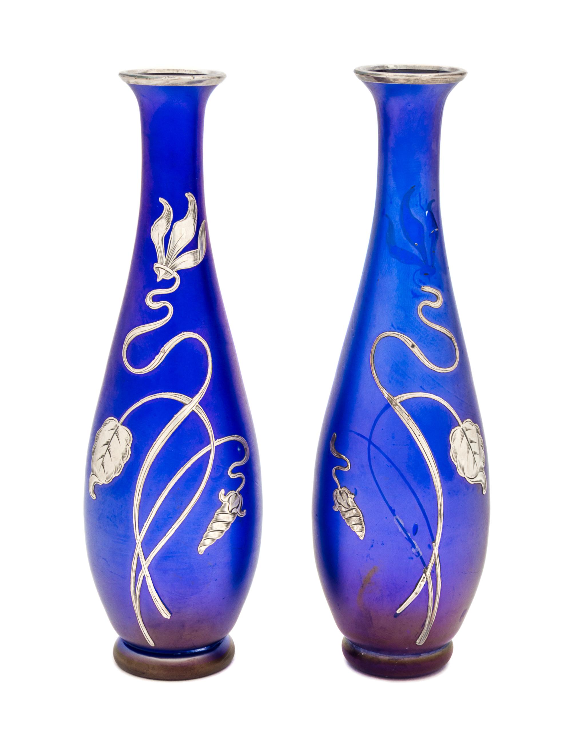 A Pair of Silver Overlay Iridescent Glass Vases Height 7 3/4 inches.