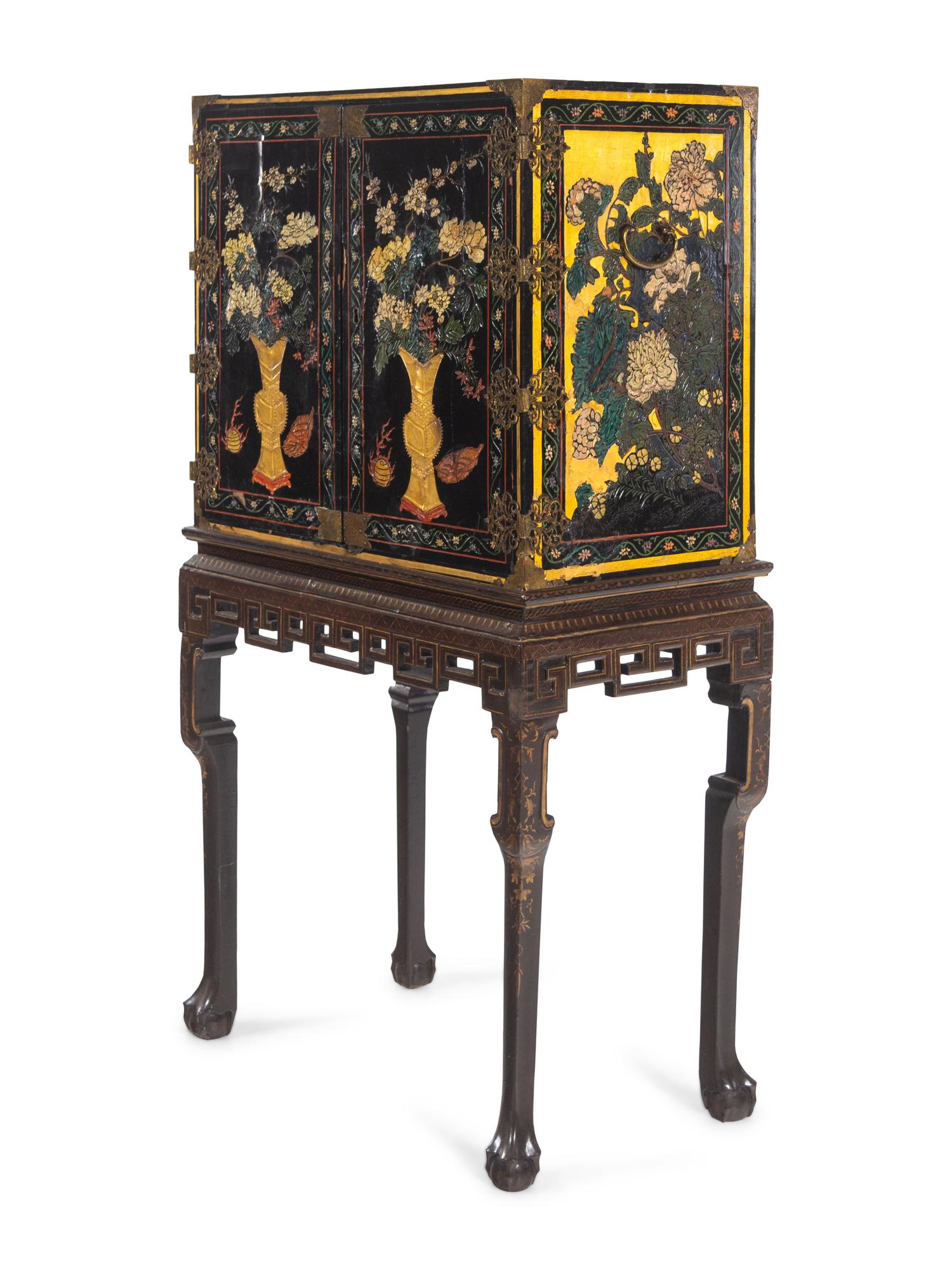 A Chinese Export Lacquer Collector's Cabinet on Stand