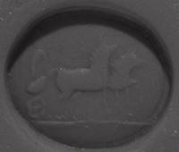 A Roman Carnelian Intaglio with Eros Driving a Biga