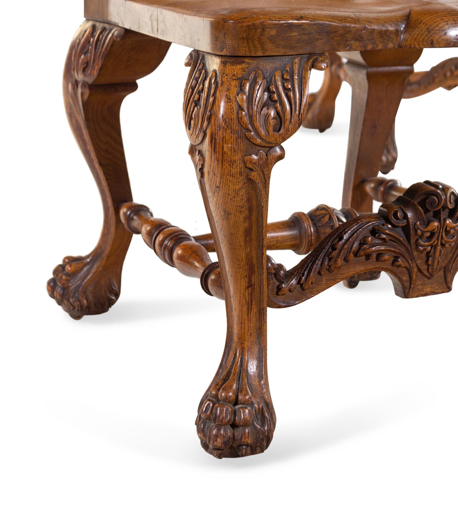 A Pair of Continental Renaissance Revival Carved Oak Side Chairs